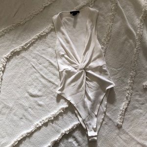 Plunge twist v neck bodysuit